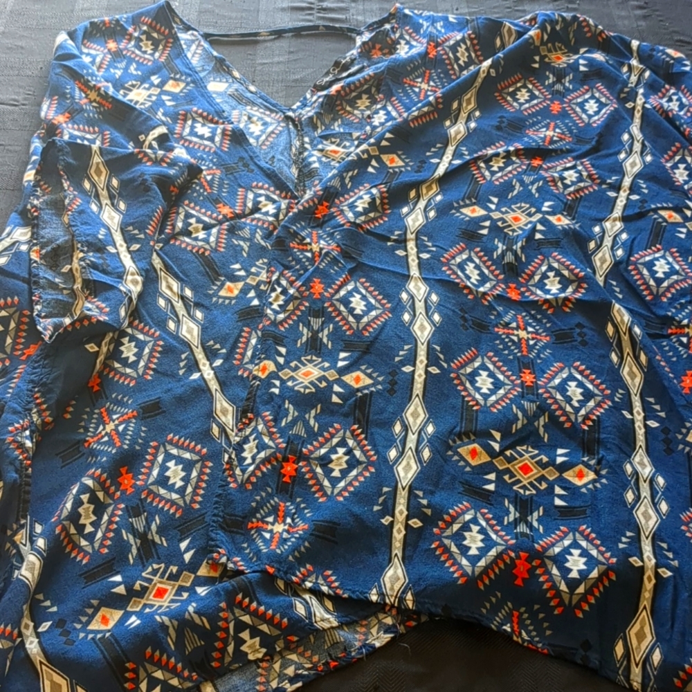 1x blue kimono with open front. Soft orange and grey and white shapes design.